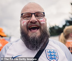 An England fan donning the Three Lions on his shirt