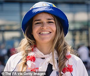 An England fan dressed in red, white and blue