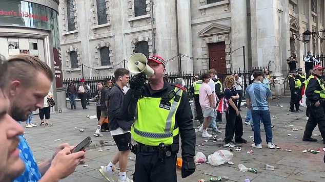 It prompted warnings by police after who have put dispersal orders in place until 2am (pictured is an officer in Trafalgar Square moving on fans)