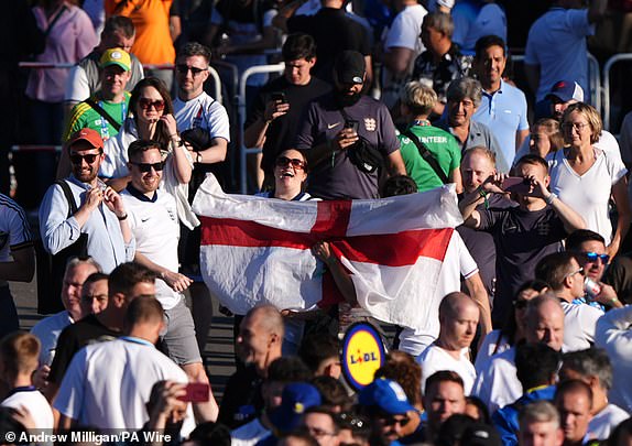 England fans outside the stadium ahead of the UEFA Euro 2024 final match at the Olympiastadion, Berlin. Picture date: Sunday July 14, 2024. PA Photo. See PA Story SOCCER England. Photo credit should read: Andrew Milligan/PA Wire.RESTRICTIONS: Use subject to restrictions. Editorial use only, no commercial use without prior consent from rights holder.