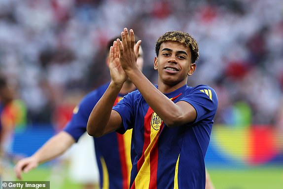 BERLIN, GERMANY - JULY 14: Lamine Yamal of Spain applauds the fans as he warms up prior to the UEFA EURO 2024 final match between Spain and England at Olympiastadion on July 14, 2024 in Berlin, Germany. (Photo by Richard Pelham/Getty Images)