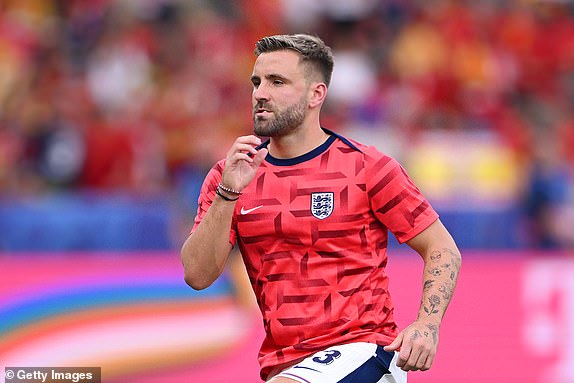 BERLIN, GERMANY - JULY 14: Luke Shaw of England warms up prior to the UEFA EURO 2024 final match between Spain and England at Olympiastadion on July 14, 2024 in Berlin, Germany. (Photo by Stu Forster/Getty Images)