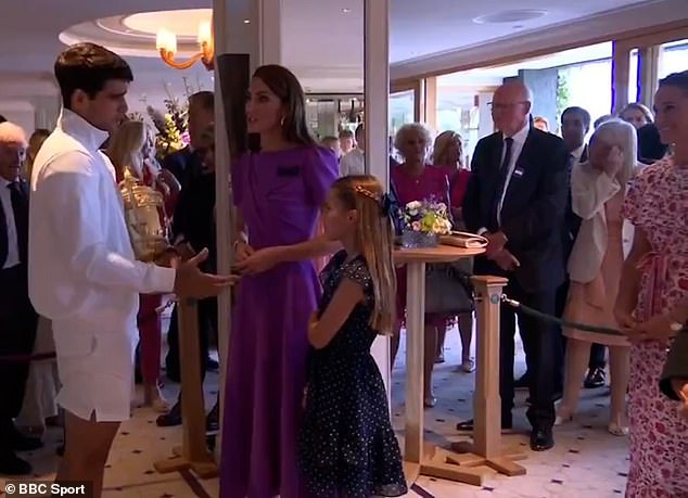 A star-struck Charlotte looked slightly shy as she stood next to Kate and smiled at Alcaraz during their conversation, as her aunt Pippa stood behind the pair and grinned at the interaction