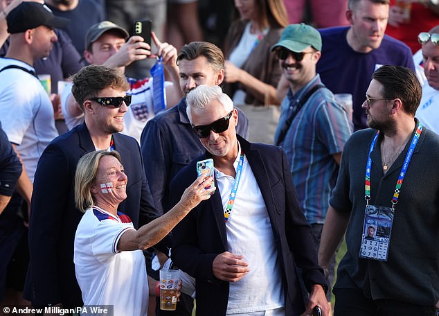 Ross and Martin Kemp pose for a photograph ahead of the UEFA Euro final at the Olympiastadion