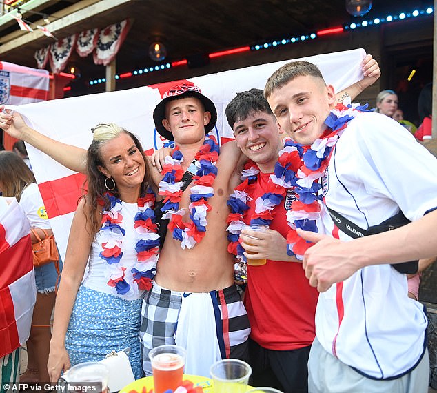 England fans prepare to watch on a screen the UEFA Euro 2024 finale football match between Spain and England, in Benidorm