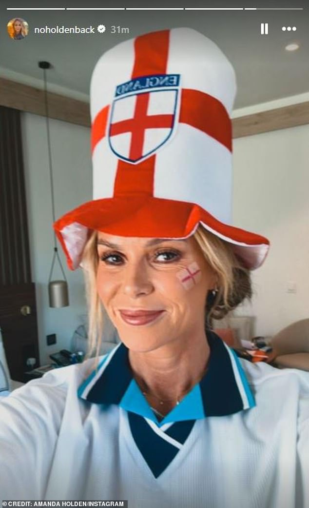 The BGT judge and radio host was in high spirits as she sang 'It's Coming Home' while sporting an England face tattoo