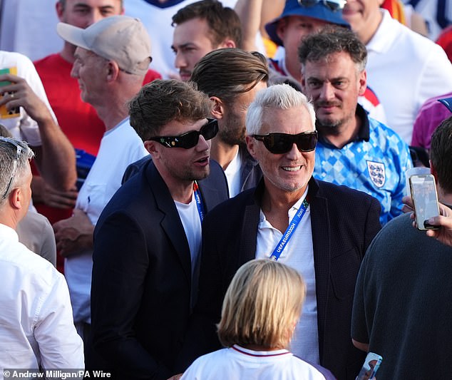 Elsewhere Martin Kemp and his son Roman mingled with England fans in Berlin as they arrived for the match