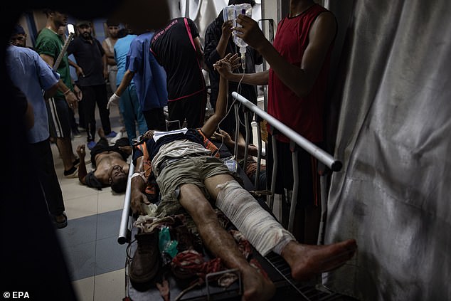 Wounded are transported to Nasser Hospital after an Israeli raid on the tents of displaced people in the Al-Mawasi area of Khan Yunis in the southern Gaza Strip, July 13, 2024