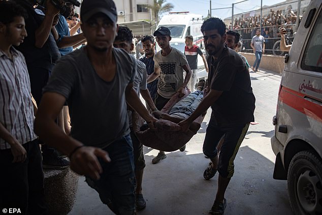 The wounded are transported to Nasser Hospital after an Israeli raid on the tents of displaced people in the Al-Mawasi area of Khan Yunis in the southern Gaza Strip, July 13, 2024