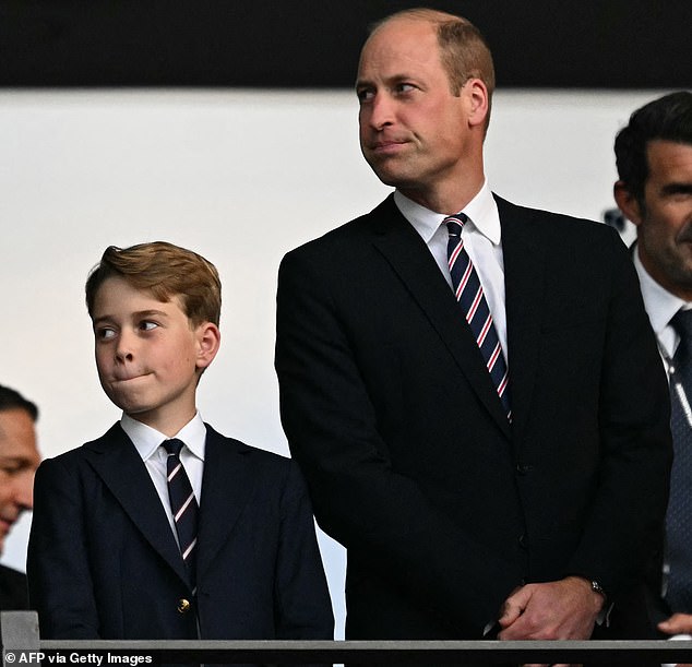 The father-and-son were pictured pulling the exact same facial expression during the match