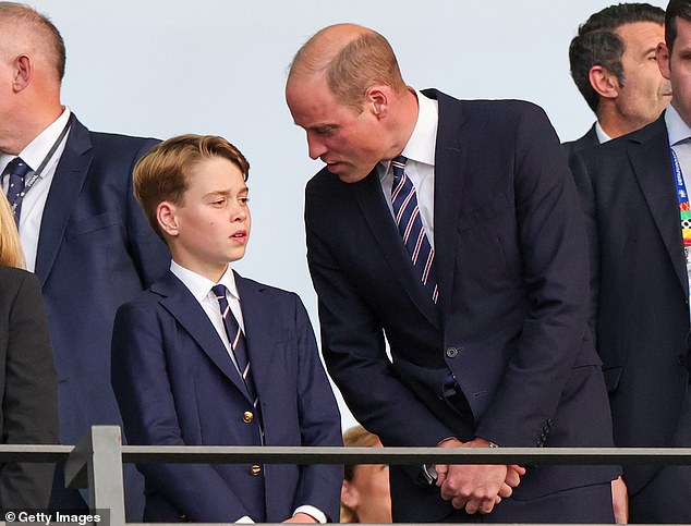 Pictured: Prince William and Prince George nervously stand in the VIP box during the opening moments