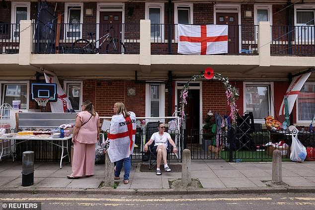 Football fans gather for the final between England and Spain on July 14