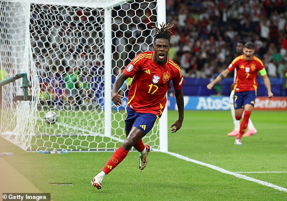 BERLIN, GERMANY - JULY 14: Nico Williams of Spain celebrates scoring his team's first goal during the UEFA EURO 2024 final match between Spain and England at Olympiastadion on July 14, 2024 in Berlin, Germany. (Photo by Richard Pelham/Getty Images)