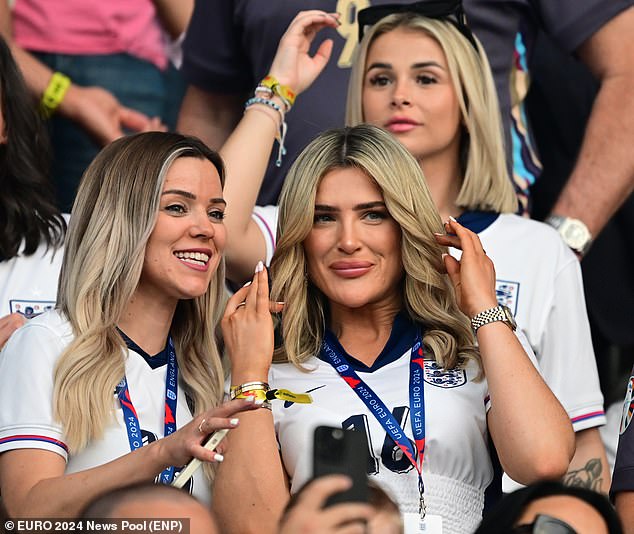 Aine May Kennedy, right, was also wearing England's uniform as she watched the action