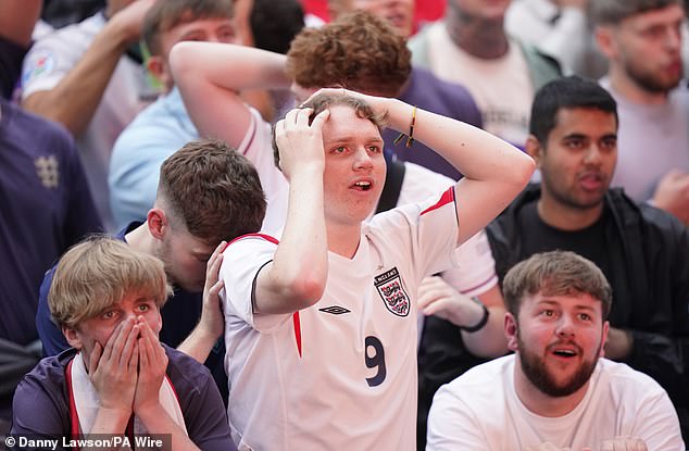 England fans at Millennium Square in Leeds react to the game which saw the Spanish claiming first blood in the opening minute of the second half