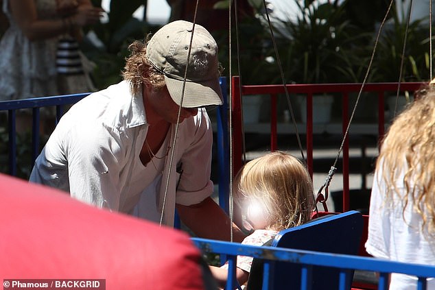 Jeremy slapped a khaki ball cap on over his curly locks and, at times wore sunglasses to ward off the glare of the Southern California sunshine