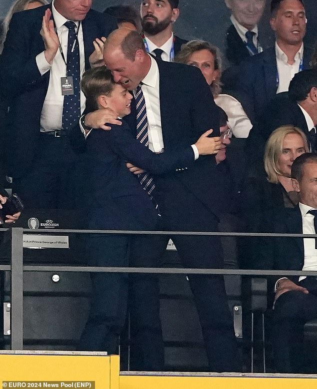 Following their celebration, Prince William turned to hug Prince George, who appeared overwhelmed with joy.