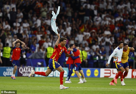 Soccer Football - Euro 2024 - Final - Spain v England - Berlin Olympiastadion, Berlin, Germany - July 14, 2024 Spain's Lamine Yamal celebrates after winning the final REUTERS/Wolfgang Rattay