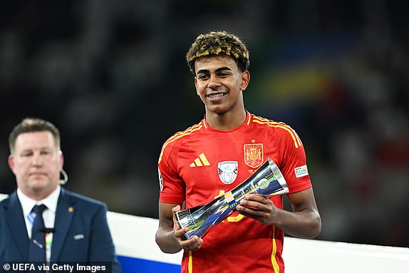 BERLIN, GERMANY - JULY 14: Lamine Yamal of Spain poses for a photo after being awarded 'Best Young Player' after the UEFA EURO 2024 final match between Spain and England at Olympiastadion on July 14, 2024 in Berlin, Germany. (Photo by Michael Regan - UEFA/UEFA via Getty Images)