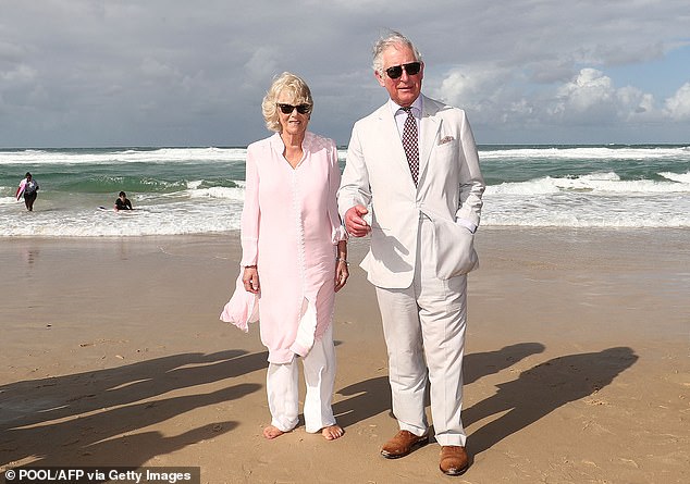 Charles and Camilla walk on Broadbeach in Gold Coast on April 5, 2018 as they attended the opening ceremony for the 2018 Gold Coast Commonwealth Games