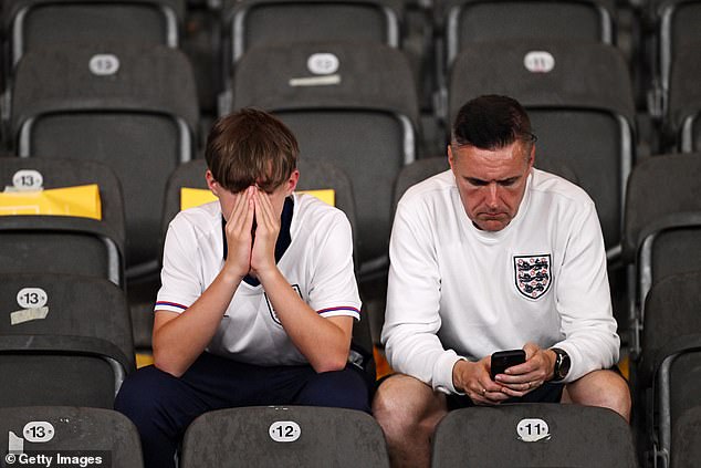 Fans at the Olympiastadion in Berlin can't believe the team's have lost