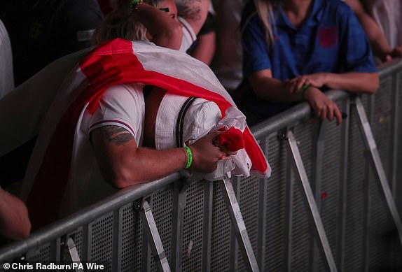 An England fan at the O2 in London, reacts to the final whistle during a screening of the UEFA Euro 2024 final between Spain and England. Picture date: Sunday July 14, 2024. PA Photo. See PA Story SOCCER England. Photo credit should read: Chris Radburn/PA Wire.RESTRICTIONS: Use subject to restrictions. Editorial use only, no commercial use without prior consent from rights holder.