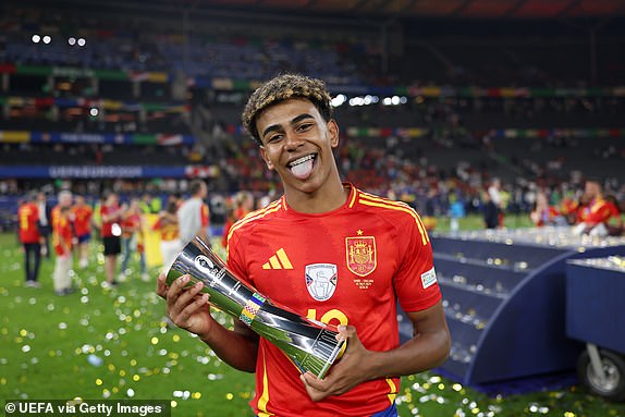 BERLIN, GERMANY - JULY 14: Lamine Yamal of Spain poses for a photo after being awarded 'Best Young Player' after the UEFA EURO 2024 final match between Spain and England at Olympiastadion on July 14, 2024 in Berlin, Germany. (Photo by Alex Pantling - UEFA/UEFA via Getty Images)