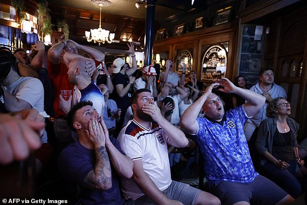 Fans in a pub in London were left crestfallen as Spain's second goal went into the back of the net, effectively sealing England's fate