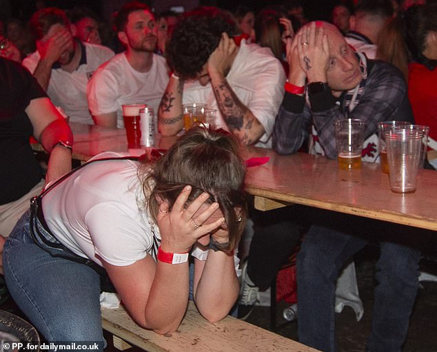 Other fans appeared to burst into tears as they watched on in horror as the Spain scored a second goal moments before the end of the game