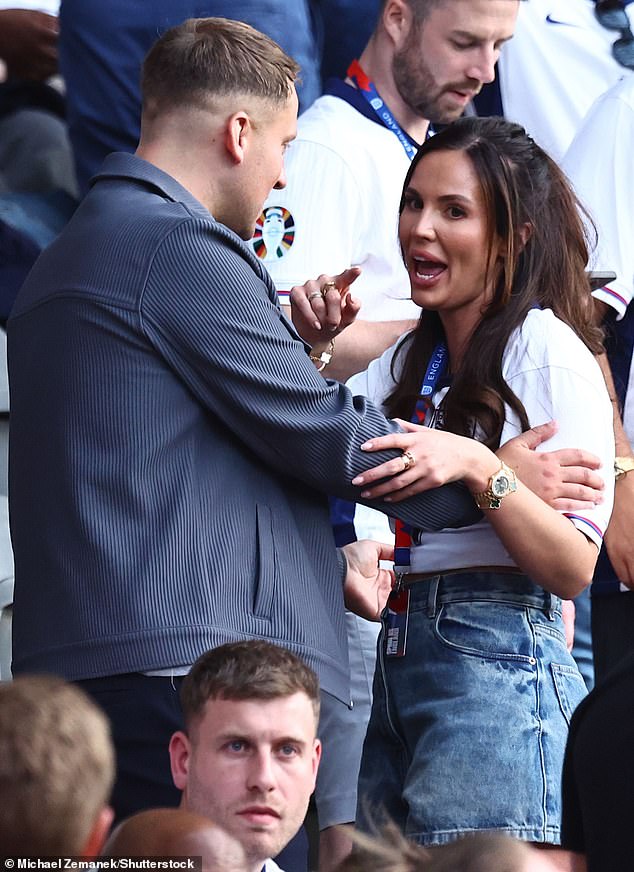 Ellie Alderson, the partner of Ollie Watkins, appeared deep in conversation as the game progressed