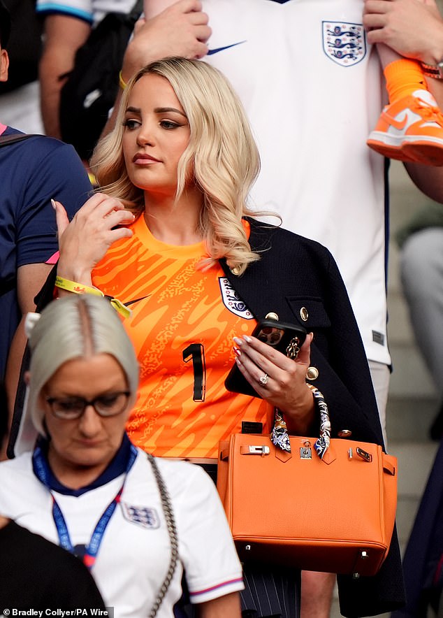 Megan Davison, partner of England's Jordan Pickford looked pensive during the UEFA Euro 2024 final match at Olympiastadion