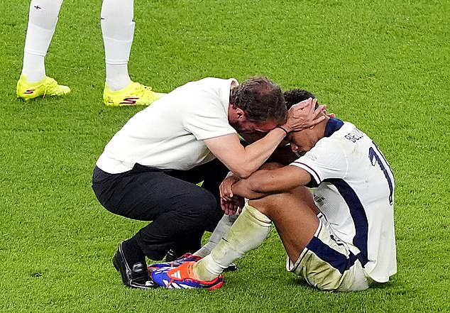 Gareth Southgate comforts Jude Bellingham on the pitch after another disappointing result for England in a major final