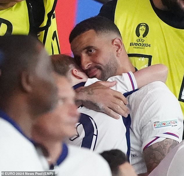 England's Kyle Walker hugged his son after the game was over