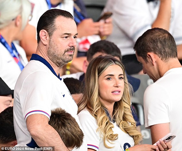 Jeremy Bowen's girlfriend Dani Dryer watches on as England struggled to contain Spain in the final