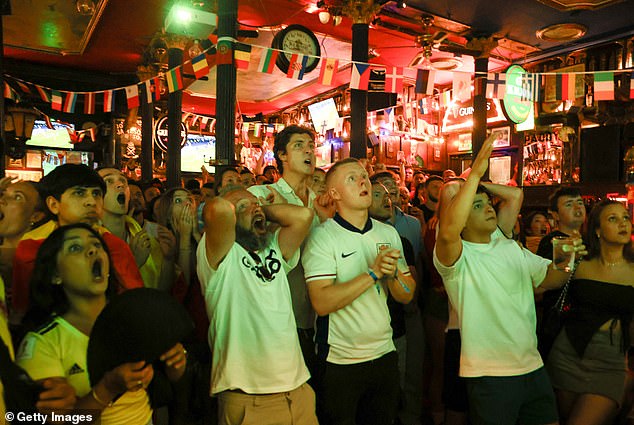 England fans in a pub in Madrid watch on as the Lions took on Spain in the final