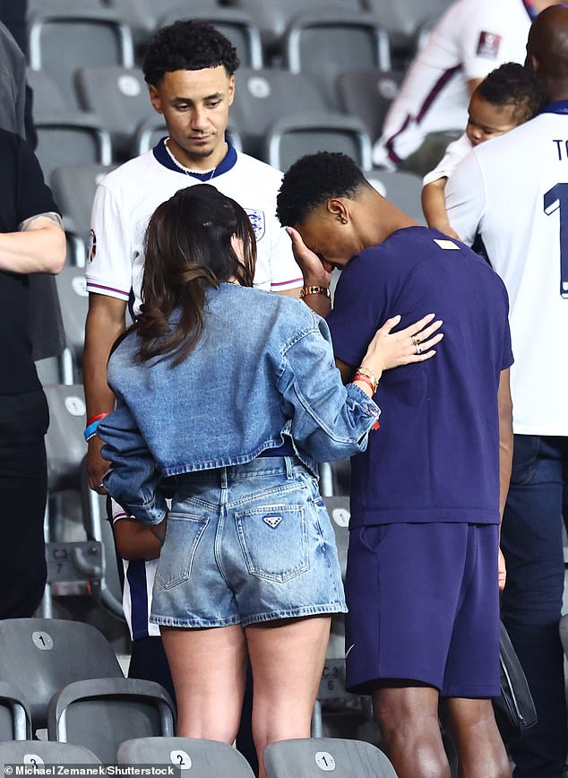 Ollie Watkins, who secured England's place in the finals with his goal against the Netherlands was consoled by his girlfriend and brother in the stands after the loss