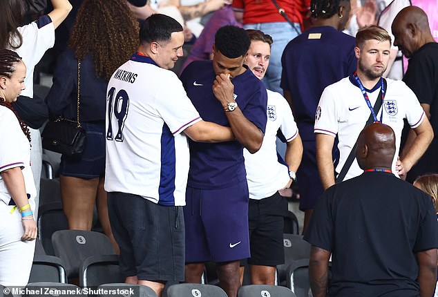 Ollie Watkins was seen hugging family and friends as he appeared to be crying after the game