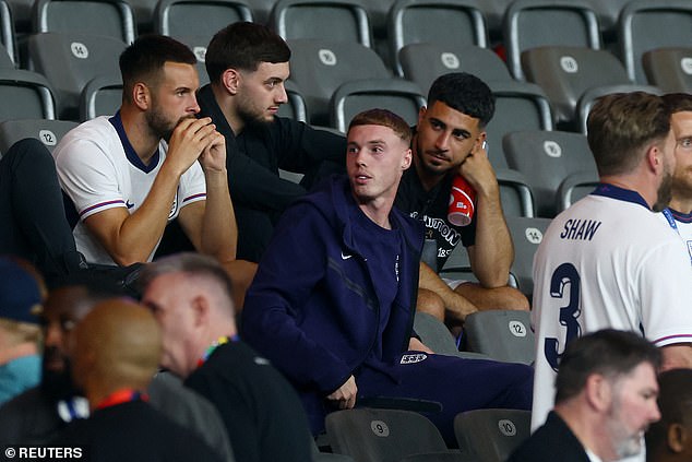 Cole Palmer also looked dejected as he sat in the stands with friends and family of the players after the match