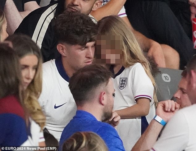 John Stones was seen sat near Dani Dyer as he returned to the stands following the match