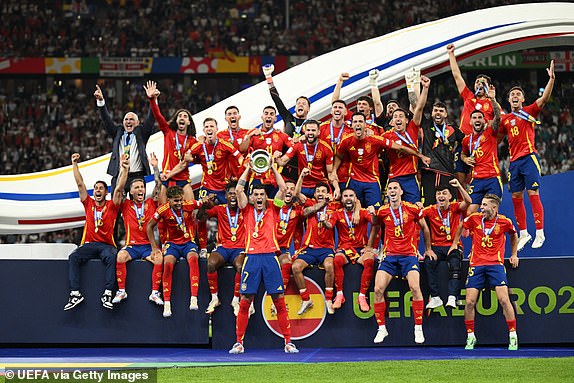 BERLIN, GERMANY - JULY 14:Alvaro Morata of Spain lifts the UEFA Euro 2024 Henri Delaunay Trophy after their team's victory after the UEFA EURO 2024 final match between Spain and England at Olympiastadion on July 14, 2024 in Berlin, Germany. (Photo by Michael Regan - UEFA/UEFA via Getty Images)