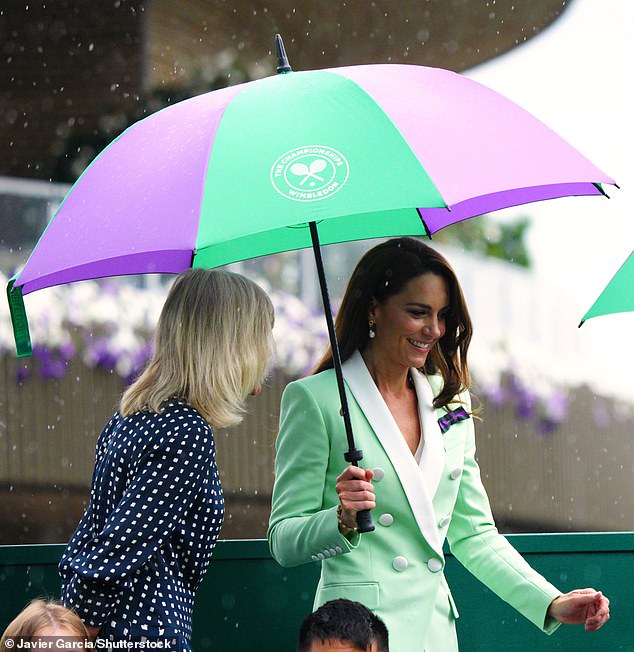 Kate  Middleton was pictured donning the bow last year along with an umbrella to watch a rainy game