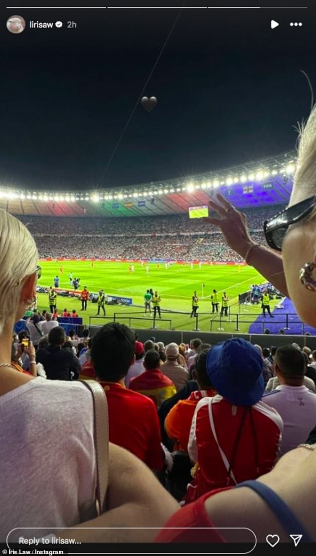 Iris was supporting the team as they lost to Spain 2-1 as she shared snaps in the stands in Germany after making the effort to travel there for him