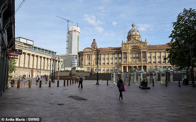 BIRMINGHAM -- Victoria Square reflected the nation's mood as people sombrely walked in the city centre