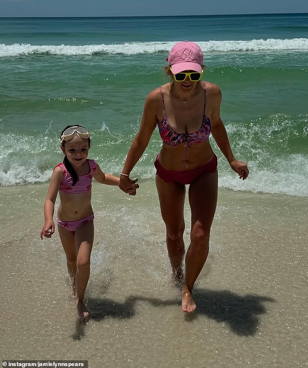 Jamie Lynn Spears enjoyed a family beach with her daughters Maddie and Ivey, as well as her mother Lynne, on Monday - amid the ongoing feud with her sister Britney (Pictured are Jamie and Ivey)