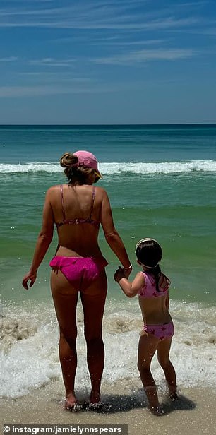 She looked sensational in the snaps, showing off her toned figure in a pink and purple patterned bikini