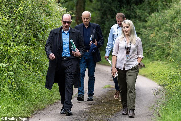 Son Ian and grandson Mark Dyer walked with members of the police search team at Stockings farm as they were shown around the search site