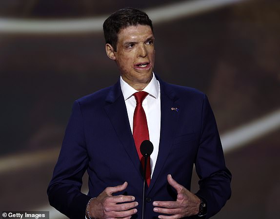 MILWAUKEE, WISCONSIN - JULY 16: Nevada Republican U.S. Senate candidate Sam Brown speaks on stage on the second day of the Republican National Convention at the Fiserv Forum on July 16, 2024 in Milwaukee, Wisconsin. Delegates, politicians, and the Republican faithful are in Milwaukee for the annual convention, concluding with former President Donald Trump accepting his party's presidential nomination. The RNC takes place from July 15-18. (Photo by Chip Somodevilla/Getty Images)