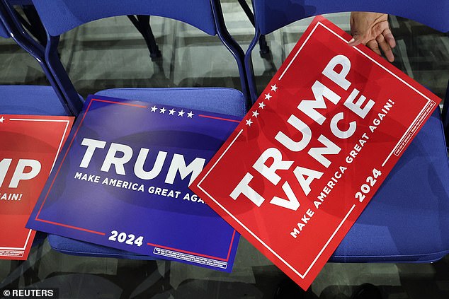 Signs in support of Republican presidential nominee and former U.S. President Donald Trump