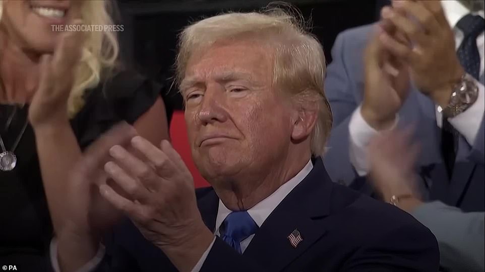 A different Trump has been on display at the convention, flashing a new mix of gratitude and vulnerability. For the second night running he was received with a thunderous roar, which he returned with a clenched fist salute. 'When we get the president walking in it's like God Almighty walking in,' said George Bochetto, an alternate delegate from Pennsylvania. He was not alone in seeing something spiritual unfold. Sarah Huckabee Sanders, governor of Arkansas and his former press secretary, said Trump's survival was a reminder that God was not finished with the nation. His daughter-in-law Lara Trump quoted Proverbs: 'The wicked flee when no one pursues, But the righteous are bold as a lion.'