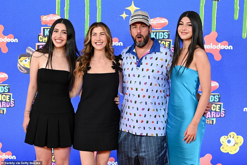 Sadie put on a radiant display wearing a strapless, vibrant blue dress as well as open-toed, white pumps